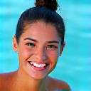 Photo of a smiling Sofia Chen after a dive.